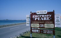 St Peters.The Guernsey Pearl and Coppercraft centre sign on side of road.