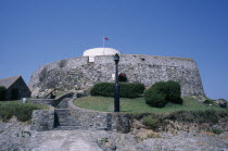 St Peters. Fort Grey Martello Tower and Shipwreck Museum. Also known as the Chateau de Rocquaine or the Cup and Saucer.