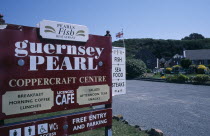 St Peters. The Guernsey Pearl and Coppercraft centre sign.