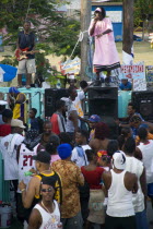 Singer and guitarist with sound system at Easterval Easter Carnival in Clifton