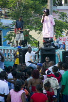 Singer and guitarist with sound system at Easterval Easter Carnival in Clifton