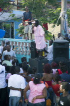 Singer and guitarist with sound system at Easterval Easter Carnival in Clifton