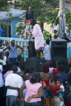 Singer and guitarist with sound system at Easterval Easter Carnival in Clifton