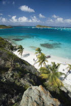 Looking over the Cays and moored yachts towards Canouan on the horizon  from Jamesby Island