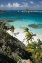 Looking over the Cays and moored yachts towards Canouan on the horizon  from Jamesby Island