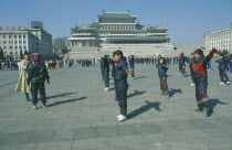 Group of women having martial arts training in Kim Il sung Square.