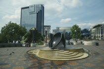 Broad Street.  Large paved square with fountain and civic buildings.