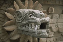 Temple of Quetzalcoatl.  Detail of carved head of plumed serpent.