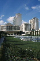 USA, Nevada, Las Vegas, fountains and lawns Caesars Palace hotel and casino on the strip.