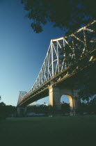 Angled view of Storey Bridge at sunset.