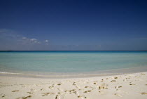 Playa Serena beach looking out to sea with footprints in the white sandBeaches Caribbean Cuban Resort Sandy Seaside Shore Tourism West Indies Hispanic Latin America Latino American