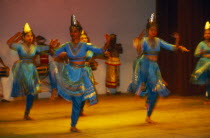 Women in full costume performing