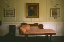 Interior with chaise-longue and paintings