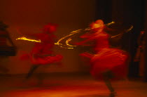 Kandy Dancers in movement blur