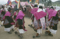 Male dancers in costume during Phujllay celebrations. Chuquisaca