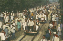 Railway inspectors checking and clearing track before train due to huge crowds returning from muslim festival.Dacca Moslem