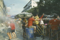 Crowd having a water fight  celebrating the Songkhran Festival. Thai New Year  15 April.