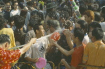 Crowd having a water fight   celebrating the Songkhran Festival. Thai New Year  15 April.