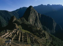 View of the hilltop ruins and the mountains beyond