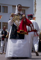 Woman dancer in traditional dress.