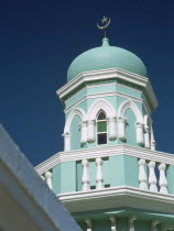 Bo Kapp District. Chiappini Street. Minaret of a small MosqueTypical architecture.The Cape Muslim area of Cape Town Moslem Colorful