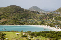 Jambu Beach at Raffles Resort and Trump International Golf Course with Union Island in the distance