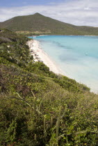 Godahl beach at Raffles Resort with Mount Royal on the horizon