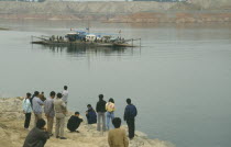 Linjiaxia Reservoir  with people waiting for the ferry