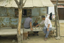 Men playing Chinese Chess