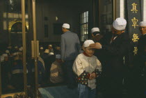 Family outside mosque.