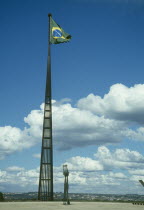 Praca dos Tres Poderes Tall spire with flag flying at the top