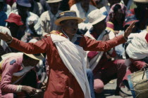 Traditional dancers and folk musicians playing to crowds.