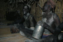 Dinka boys fattening themselves for eight weeks in preparation for manhood.initiation