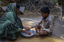 Health education.  Boy learning the importance of washing hands.sanitationhygiene