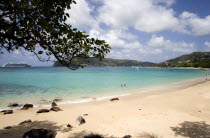 Lower Bay beach with cruise ship moored offshore