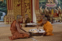 Buddhist monks eating meal in Wat Chan.