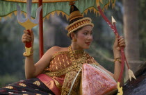 Young woman dressed as Goddess of the Year during New Year celebrations.