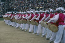 Line of musicians with drums at Childrens Day celebrations.