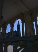 Church seen through cloister arches