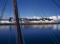 View across the River Corrib toward colourful houses near the Spanish ArchEireEireEireEireEire