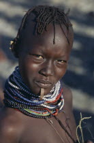 Portrait of El Molo girl wearing traditional jewellery