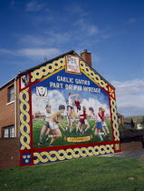 Ardoyne mural depicting traditional Gaelic sports.