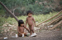 Two Embera Indian children playing with plastic cups and bowlsEmbera is an indigenous territory and also a language group in Colombia and Panama