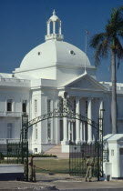 The Presidential Palace.  Detail of white painted exterior with dome and colonnaded entrance.