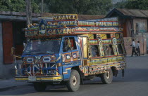 Brightly painted taptap bus.