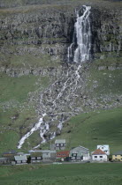 Waterfall and village.