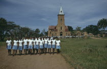 School choir posing for photograph outside Lisala Cathedral. Zaire