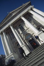 Angled view looking up the steps toward the columned facade of the Tate Britain Gallery