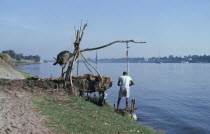 Shadouf irrigation. Shadouf is a machine to move water from a lower place to a higher place