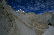 View over mountain landscape around the Jhargeng khola river valley and Phedi with the snow capped peak of Yakawa Kang Mountain in the distance.